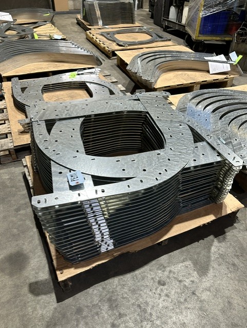 MLC Manufacturing — laser cut ring parts on pallet