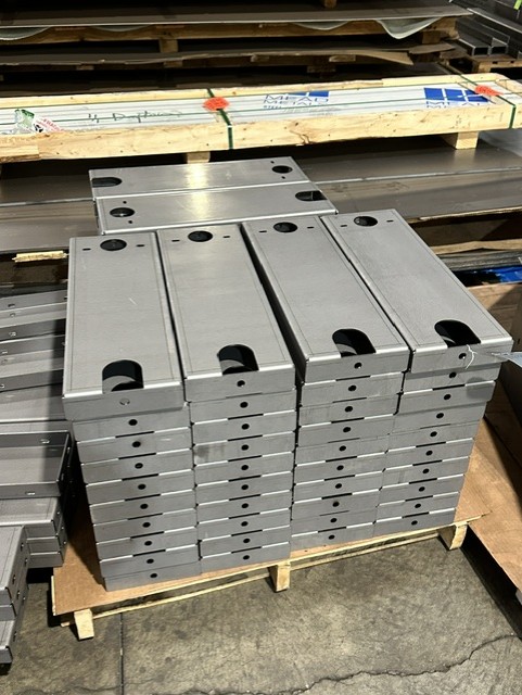 MLC Manufacturing — stacked fabricated enclosures