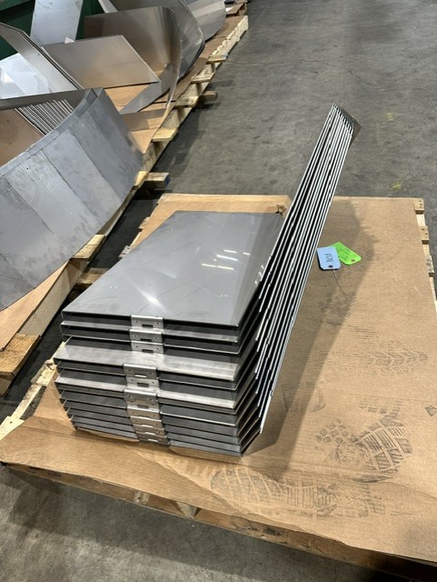 MLC Manufacturing — stacked sheet metal panels