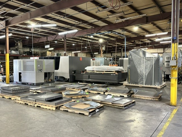 MLC Manufacturing — shop floor with laser and press brake