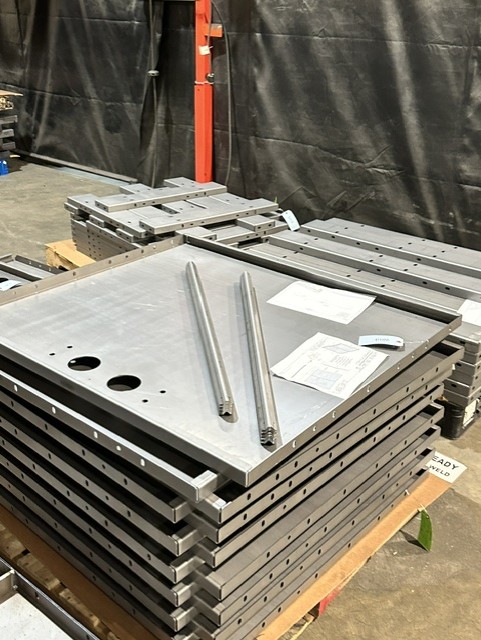 MLC Manufacturing — precision drilled steel plates