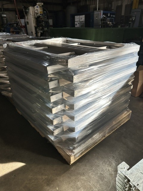 MLC Manufacturing — stacked wrapped sheet metal frames