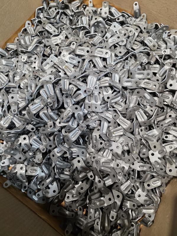 MLC Manufacturing — stamped metal brackets in bulk